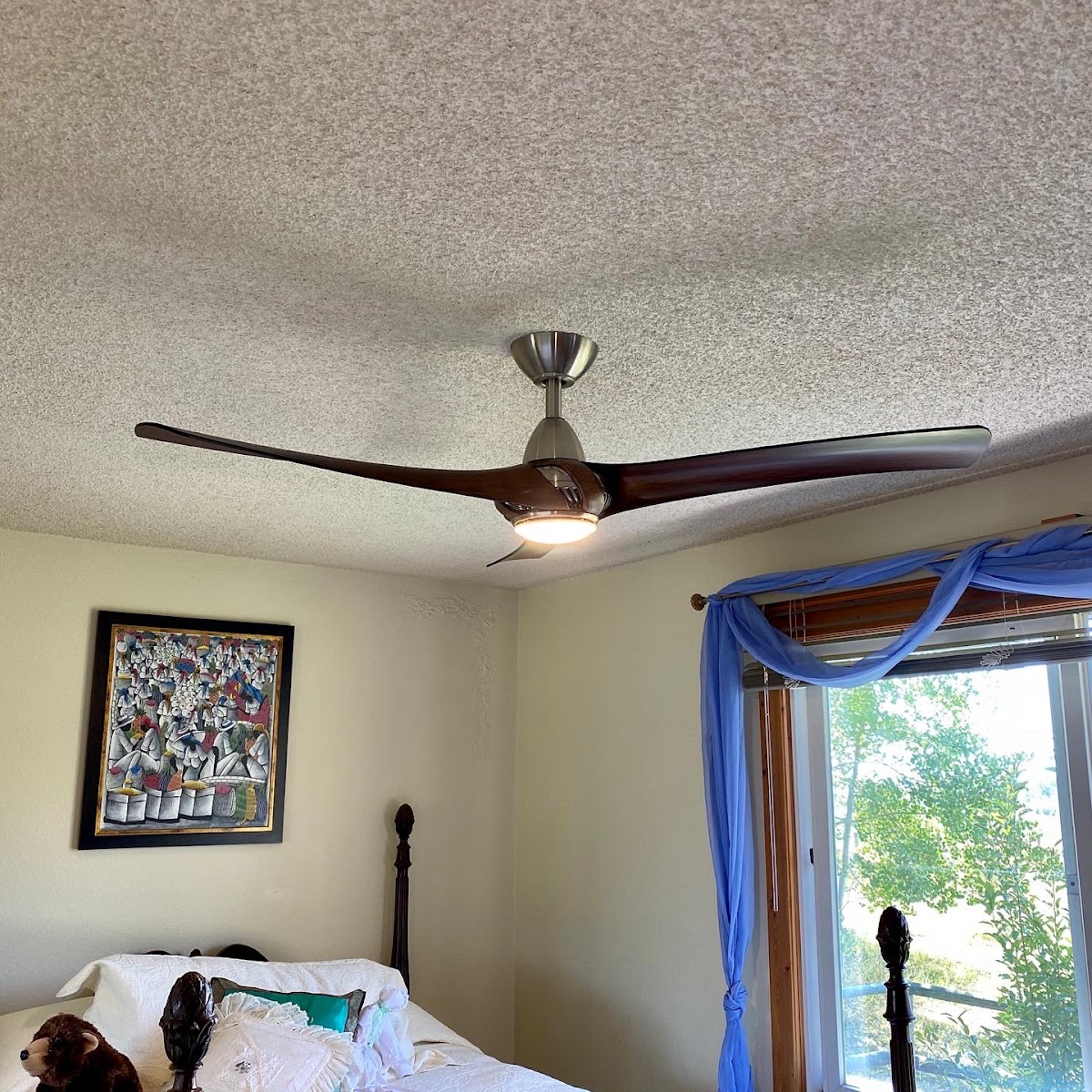 Bedroom ceiling fan with light installed
